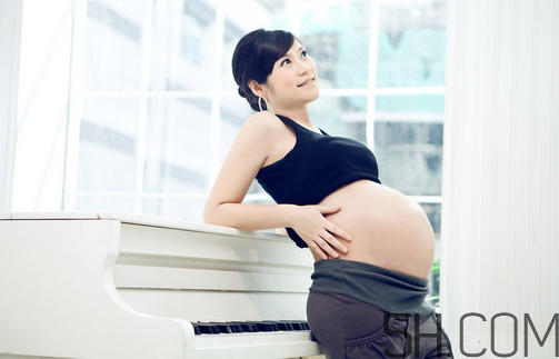 孕晚期肚子疼影響胎兒?jiǎn)?？孕晚期肚子像?lái)月經(jīng)一樣疼